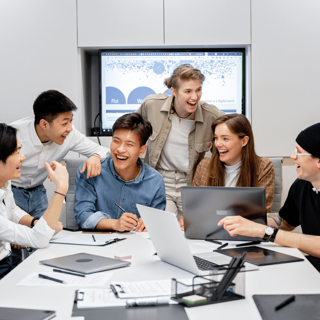 Diverse team collaborating during an ERP implementation strategy meeting in a modern office â€“ ERP services USA