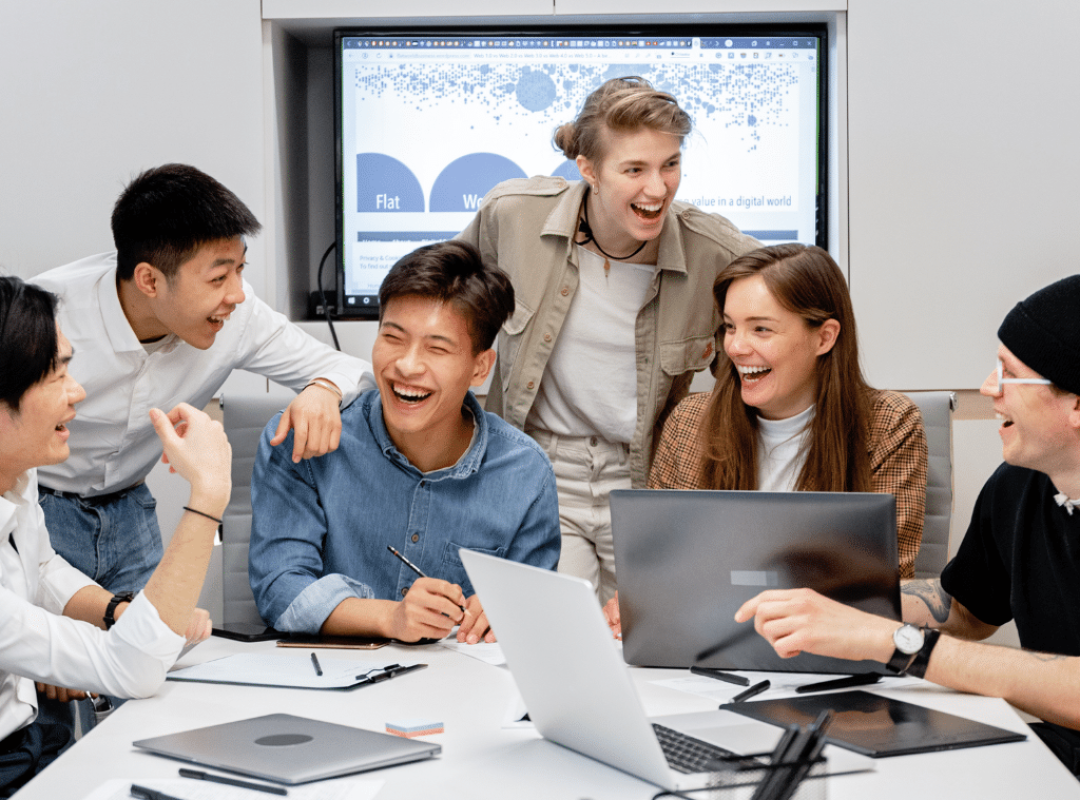 Diverse team collaborating during an ERP implementation strategy meeting in a modern office â€“ ERP services USA